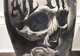 Black skull tattoo by Benjamin Laukis
