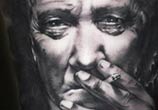 Portrait tattoo of David Lynch by Benjamin Laukis