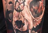 Skull tattoo by Benjamin Laukis