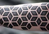 Geometrical Dotwork tattoo by Kamil Czapiga