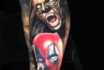 Wolverine and Deadpool tattoo by Nikko Hurtado