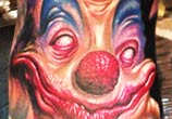 Horror clown portrait tattoo by Paul Acker
