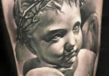 Baby angel tattoo by Sergey Shanko